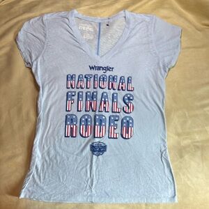 Light blue “NFR” tee shirt.